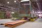 At the transfer station the bus is lifted free up by four elevating platforms that can sink into the floor, allowing the journey to be continued on its own wheels.
