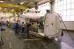 A CNC machining centre being delivered on air cushions. The floor has been covered with mats to allow the use of air cushion technology.
